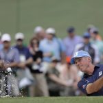 Matt Kuchar hits from a bunker on the seventh hole during the second round for the Masters golf tournament Friday, April 12, 2019, in Augusta, Ga. (AP Photo/David J. Phillip)