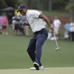 Tiger Woods reacts to his birdie putt on the 15th hole during the second round for the Masters golf tournament Friday, April 12, 2019, in Augusta, Ga. (AP Photo/David J. Phillip)