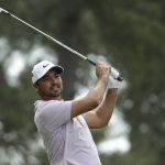 Jason Day, of Australia, hits on the fourth hole during the second round for the Masters golf tournament Friday, April 12, 2019, in Augusta, Ga. (AP Photo/Chris Carlson)