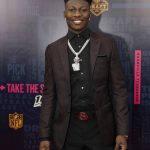 Oklahoma wide receiver Marquise Brown walks the red carpet ahead of the first round at the NFL football draft, Thursday, April 25, 2019, in Nashville, Tenn. (AP Photo/Mark Humphrey)