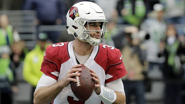 Arizona Cardinals quarterback Josh Rosen drops back to pass against the Seattle Seahawks during the...