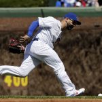 Chicago Cubs second baseman Daniel Descalso can't make the play on a single by Arizona Diamondbacks' Christian Walker during the first inning of a baseball game Saturday, April 20, 2019, in Chicago. (AP Photo/Nam Y. Huh)