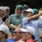 Justin Thomas hits on the ninth tee during the second round for the Masters golf tournament Friday, April 12, 2019, in Augusta, Ga. (AP Photo/Charlie Riedel)