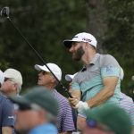 Dustin Johnson watches his drive on the 18th hole during the second round for the Masters golf tournament Friday, April 12, 2019, in Augusta, Ga. (AP Photo/Charlie Riedel)