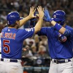 Chicago Cubs' Kris Bryant, right, is congratulated by teammate Albert Almora (5) after hitting a two-run home run against the Arizona Diamondbacks during the third inning of a baseball game, Friday, April 26, 2019, in Phoenix. (AP Photo/Ralph Freso)