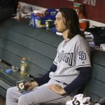 San Diego Padres starting pitcher Matt Strahm sits in the dugout during the fifth inning of the team's baseball game against the Arizona Diamondbacks on Saturday, April 13, 2019, in Phoenix. (AP Photo/Ross D. Franklin)