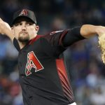 Arizona Diamondbacks starting pitcher Zack Godley throws against the Chicago Cubs during the first inning of a baseball game, Saturday, April 27, 2019, in Phoenix. (AP Photo/Ralph Freso)