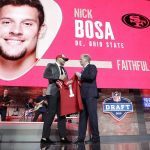 Ohio State defensive end Nick Bosa poses with NFL Commissioner Roger Goodell after the San Francisco 49ers selected Bosa in the first round at the NFL football draft, Thursday, April 25, 2019, in Nashville, Tenn. (AP Photo/Mark Humphrey)