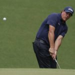 Phil Mickelson hits to the 10th green during the second round for the Masters golf tournament Friday, April 12, 2019, in Augusta, Ga. (AP Photo/Chris Carlson)