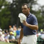 Francesco Molinari, of Italy, walks off the 18th green during the second round for the Masters golf tournament Friday, April 12, 2019, in Augusta, Ga. (AP Photo/Matt Slocum)