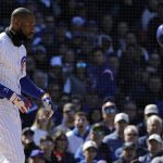 Chicago Cubs' Jason Heyward throws his helmet after being called out on strikes during the fourth inning of a baseball game against the Arizona Diamondbacks, Saturday, April 20, 2019, in Chicago. (AP Photo/Nam Y. Huh)