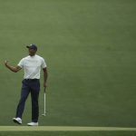 Tiger Woods reacts after making a birdie on the 15th hole during the second round for the Masters golf tournament Friday, April 12, 2019, in Augusta, Ga. (AP Photo/Charlie Riedel)