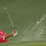 Hideki Matsuyama, of Japan, hits from a bunker on the second hole during the second round for the Masters golf tournament Friday, April 12, 2019, in Augusta, Ga. (AP Photo/Matt Slocum)