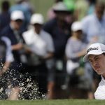 Patrick Cantlay hits from a bunker on the seventh hole during the second round for the Masters golf tournament Friday, April 12, 2019, in Augusta, Ga. (AP Photo/David J. Phillip)