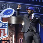Houston defensive tackle Ed Oliver takes the stage after the Buffalo Bills selected him in the first round at the NFL football draft, Thursday, April 25, 2019, in Nashville, Tenn. (AP Photo/Mark Humphrey)