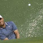 Francesco Molinari, of Italy, hits from a bunker on the second hole during the second round for the Masters golf tournament Friday, April 12, 2019, in Augusta, Ga. (AP Photo/Matt Slocum)