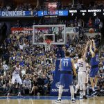 Dallas Mavericks forward Dirk Nowitzki (41) shoots over Phoenix Suns' Dragan Bender (35) during the first half of an NBA basketball game in Dallas, Tuesday, April 9, 2019. (AP Photo/Tony Gutierrez)