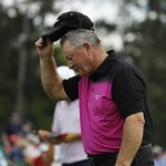 Ian Woosnam, of Wales, tips his hat as he walks off the 18th hole during the second round for the Masters golf tournament Friday, April 12, 2019, in Augusta, Ga. Woosnam says this will be his last Masters. (AP Photo/Matt Slocum)