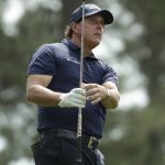 Phil Mickelson watches his shot on the fourth hole during the second round for the Masters golf tournament Friday, April 12, 2019, in Augusta, Ga. (AP Photo/Chris Carlson)