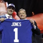 Duke quarterback Daniel Jones poses with NFL Commissioner Roger Goodell after the New York Giants selected Jones in the first round at the NFL football draft, Thursday, April 25, 2019, in Nashville, Tenn. (AP Photo/Mark Humphrey)