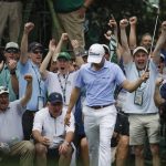 the crowd reacts Justin Thomas birdies the sixth hole during the second round for the Masters golf tournament Friday, April 12, 2019, in Augusta, Ga. (AP Photo/Charlie Riedel)