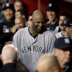 New York Yankees starting pitcher C.C. Sabathia walks through the dugout after throwing his 3,000th career strikeout, during the second inning of the team's baseball game against the Arizona Diamondbacks, Tuesday, April 30, 2019, in Phoenix. (AP Photo/Matt York)
