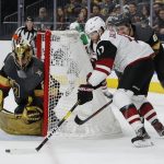 Arizona Coyotes center Alex Galchenyuk (17) attempts a wraparound shot against Vegas Golden Knights goaltender Marc-Andre Fleury during the third period of an NHL hockey game Thursday, April 4, 2019, in Las Vegas. (AP Photo/John Locher)
