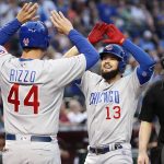 Chicago Cubs' David Bote (13) is congratulated by teammate Anthony Rizzo (44) after hitting a two-run home run against the Arizona Diamondbacks during the fifth inning of a baseball game, Saturday, April 27, 2019, in Phoenix. It was Bote's second home run of the game. (AP Photo/Ralph Freso)