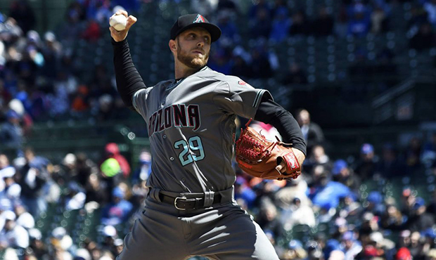 Arizona Diamondbacks starting pitcher Merrill Kelly (29) throws against the Chicago Cubs during the...