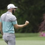 Dustin Johnson react after chipping in for birdie on the 13th hole during the second round for the Masters golf tournament Friday, April 12, 2019, in Augusta, Ga. (AP Photo/David J. Phillip)