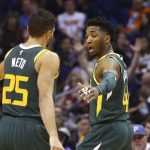 Utah Jazz guard Donovan Mitchell, right, celebrates his 3-pointer against the Phoenix Suns with Jazz guard Raul Neto (25) during the second half of an NBA basketball Wednesday, April 3, 2019, in Phoenix. The Jazz won 118-97. (AP Photo/Ross D. Franklin)