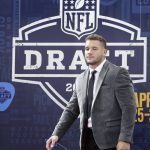 Ohio State defensive end Nick Bosa walks the red carpet ahead of the first round at the NFL football draft, Thursday, April 25, 2019, in Nashville, Tenn. (AP Photo/Steve Helber)