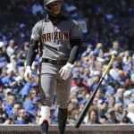 Arizona Diamondbacks' Ketel Marte throws his bat after striking out swinging against the Chicago Cubs during the first inning of a baseball game Saturday, April 20, 2019, in Chicago. (AP Photo/Nam Y. Huh)