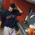Boston Red Sox starting pitcher Rick Porcello paces in the dugout after being pulled from a baseball game during the fifth inning against the Arizona Diamondbacks Friday, April 5, 2019, in Phoenix. (AP Photo/Ross D. Franklin)