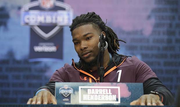 Memphis running back Darrell Henderson speaks during a press conference at the NFL football scoutin...