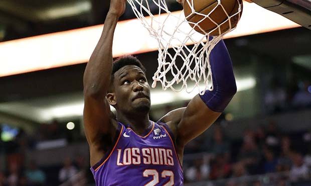 Phoenix Suns center Deandre Ayton (22) dunks against the Chicago Bulls during the first half of an ...