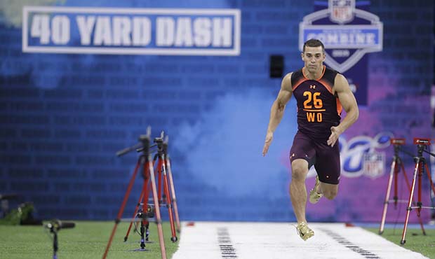Massachusetts wide receiver Andy Isabella runs the 40-yard dash during the NFL football scouting co...