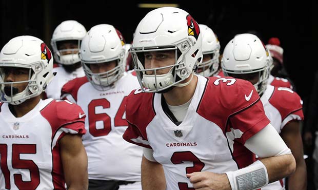 Arizona Cardinals quarterback Josh Rosen (3) leads his team onto the field to warm-up before an NFL...