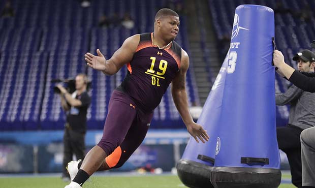 Alabama defensive lineman Quinnen Williams runs a drill at the NFL football scouting combine in Ind...