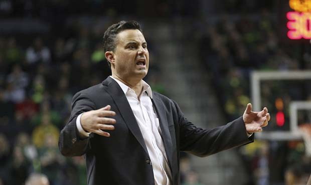 Arizona coach Sean Miller reacts to a play call during the first half of the team's NCAA college ba...