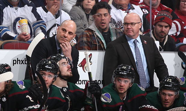 Head coach Rick Tocchet of the Arizona Coyotes reacts on the bench during the NHL game against the ...