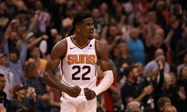 Deandre Ayton #22 of the Phoenix Suns reacts during the final moments of the NBA game against the M...