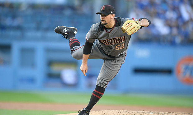 Zack Godley #52 of the Arizona Diamondbacks pitches against the Los Angeles Dodgers in the second i...