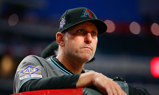 Manager Torey Lovullo  of the Arizona Diamondbacks watches on in the fourth inning of an MLB game a...