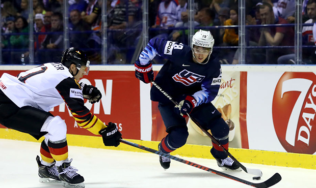 Jonas Mueller of Germany challenges Clayton Keller of United States during the 2019 IIHF Ice Hockey...