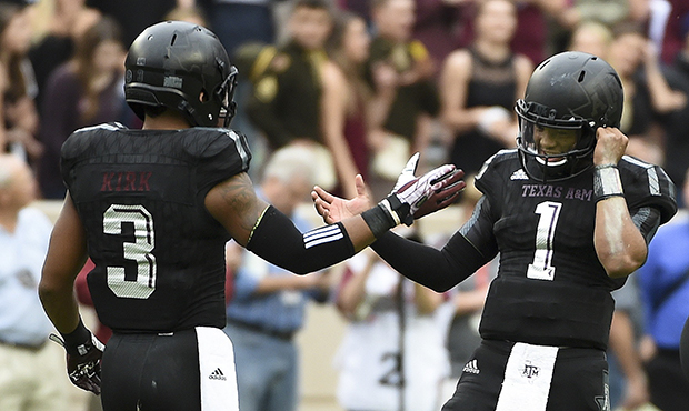 Kyler Murray #1 and Christian Kirk #3 of the Texas A&M Aggies celebrate the Aggies' 35-28 victo...