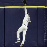 Tampa Bay Rays center fielder Kevin Kiermaier makes a leaping catch on a flyout by Arizona Diamondbacks' Carson Kelly during the fifth inning of a baseball game, Tuesday, May 7, 2019, in St. Petersburg, Fla. (AP Photo/Chris O'Meara)