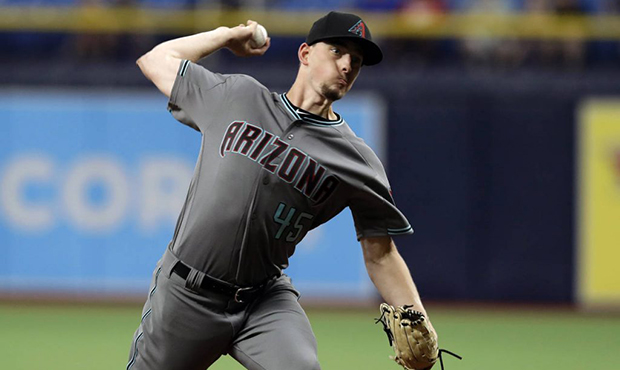 Arizona Diamondbacks pitcher Taylor Clarke delivers to the Tampa Bay Rays during the first inning o...