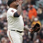San Francisco Giants pitcher Reyes Moronta points skyward after getting the last out of the seventh inning against the Arizona Diamondbacks in a baseball game in San Francisco, Sunday, May 26, 2019. (AP Photo/Tony Avelar)