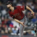 Arizona Diamondbacks relief pitcher Stefan Crichton works against the Colorado Rockies in the fifth inning of a baseball game Wednesday, May 29, 2019, in Denver. (AP Photo/David Zalubowski)
